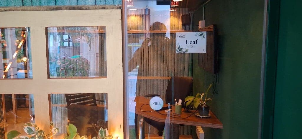 Leaf Meeting Room signage and interior glimpse